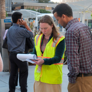 SFMTA volunteer polling a pedestrian. Links to Evaluating & Monitoring Our Progress page.